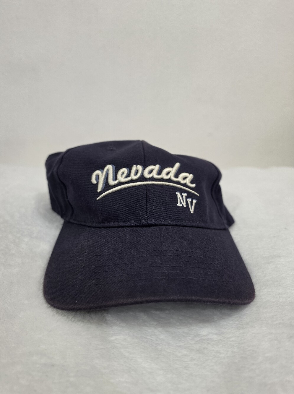 Nevada NV Embroidered Baseball Cap in Navy Blue & White
